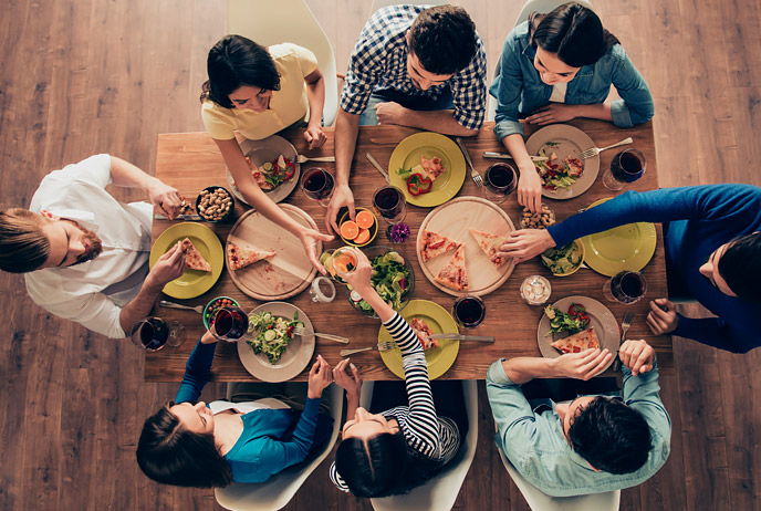 image of young people eating at table