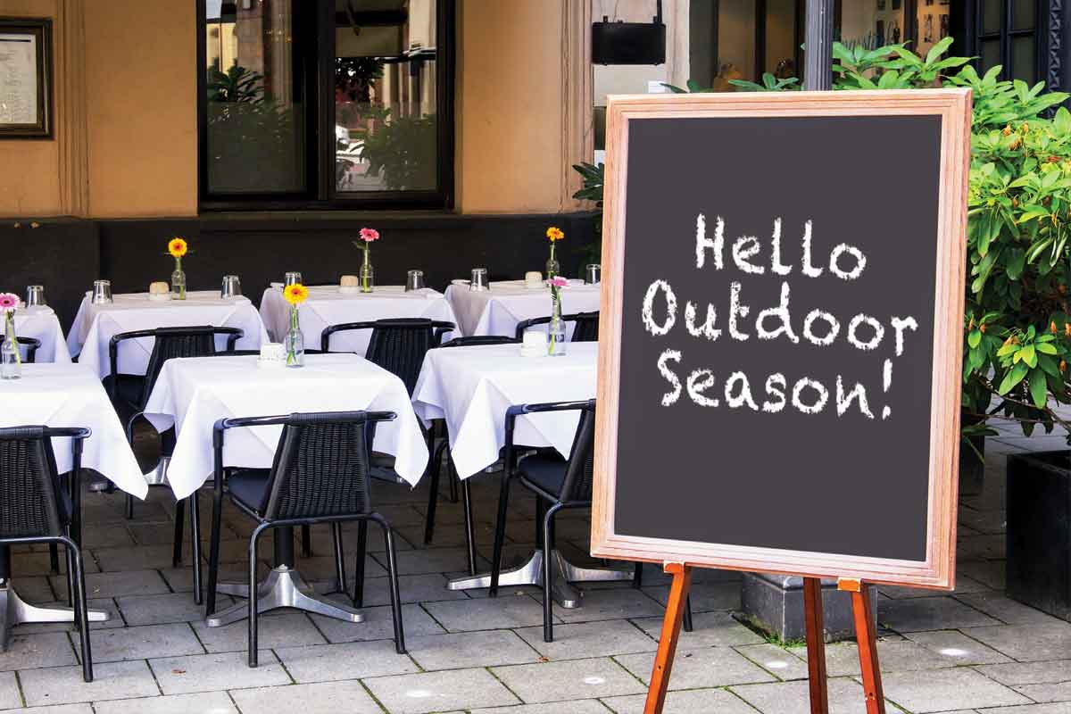 image of outdoor restaurant with table cloth linen