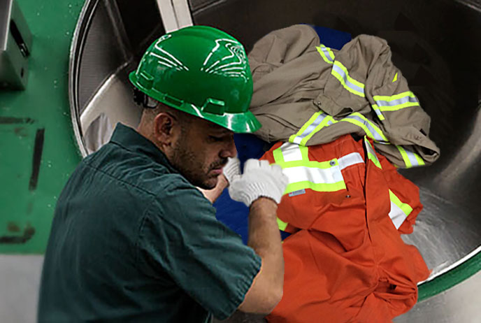 Image of man feeding washing machine