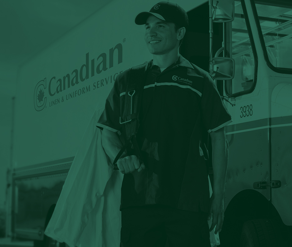 Image of driver in front of his truck