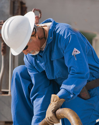 Man wearing gas uniform